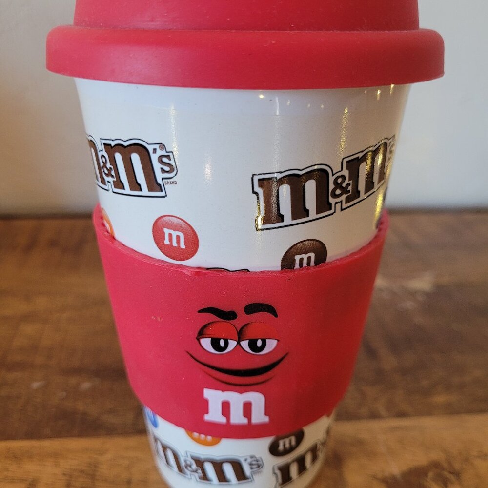M&M Coffee Mug With Red Lid and Sleeve 16 oz Collectible